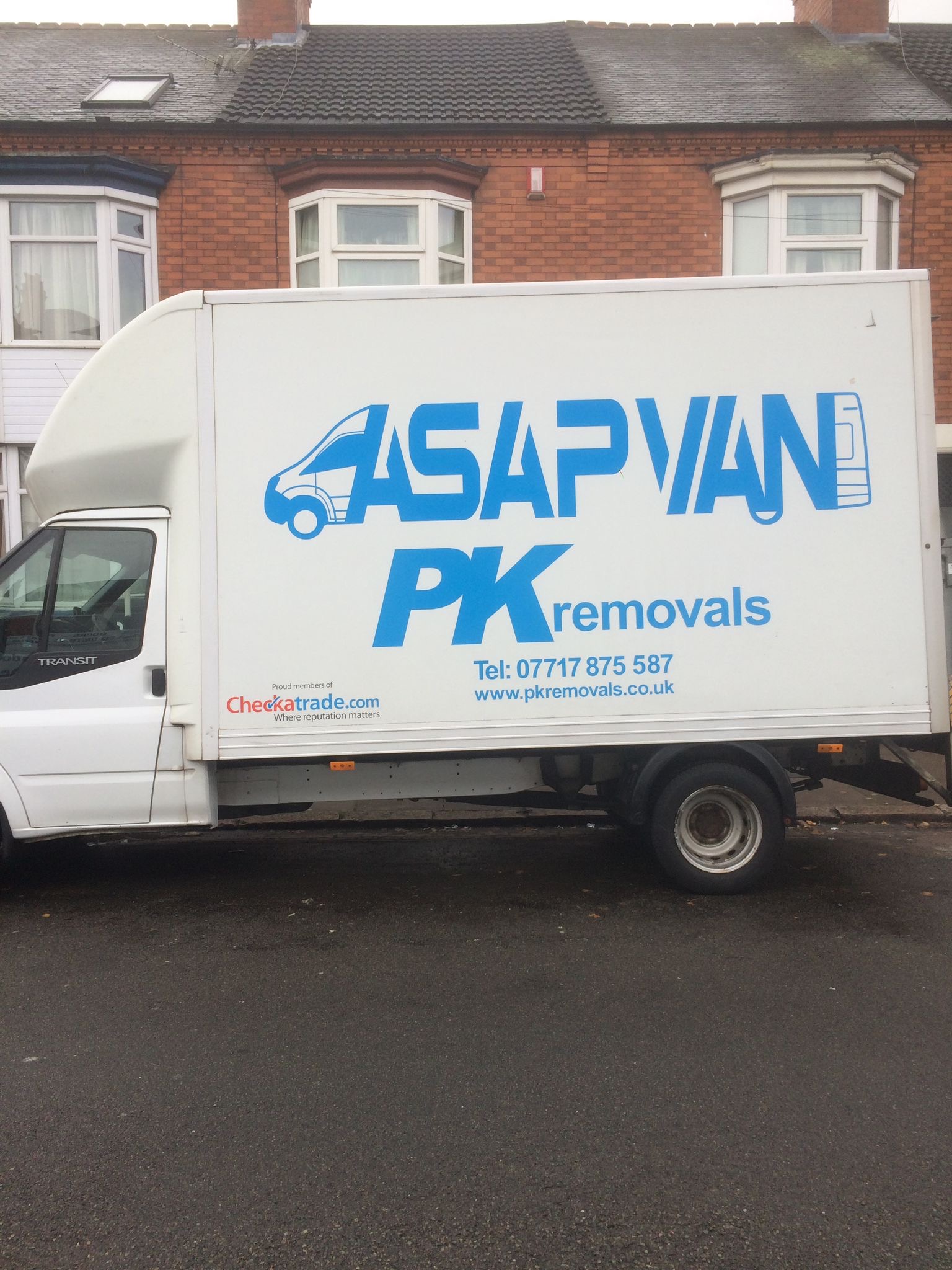 PK Removals Luton van parked on a Leicester street